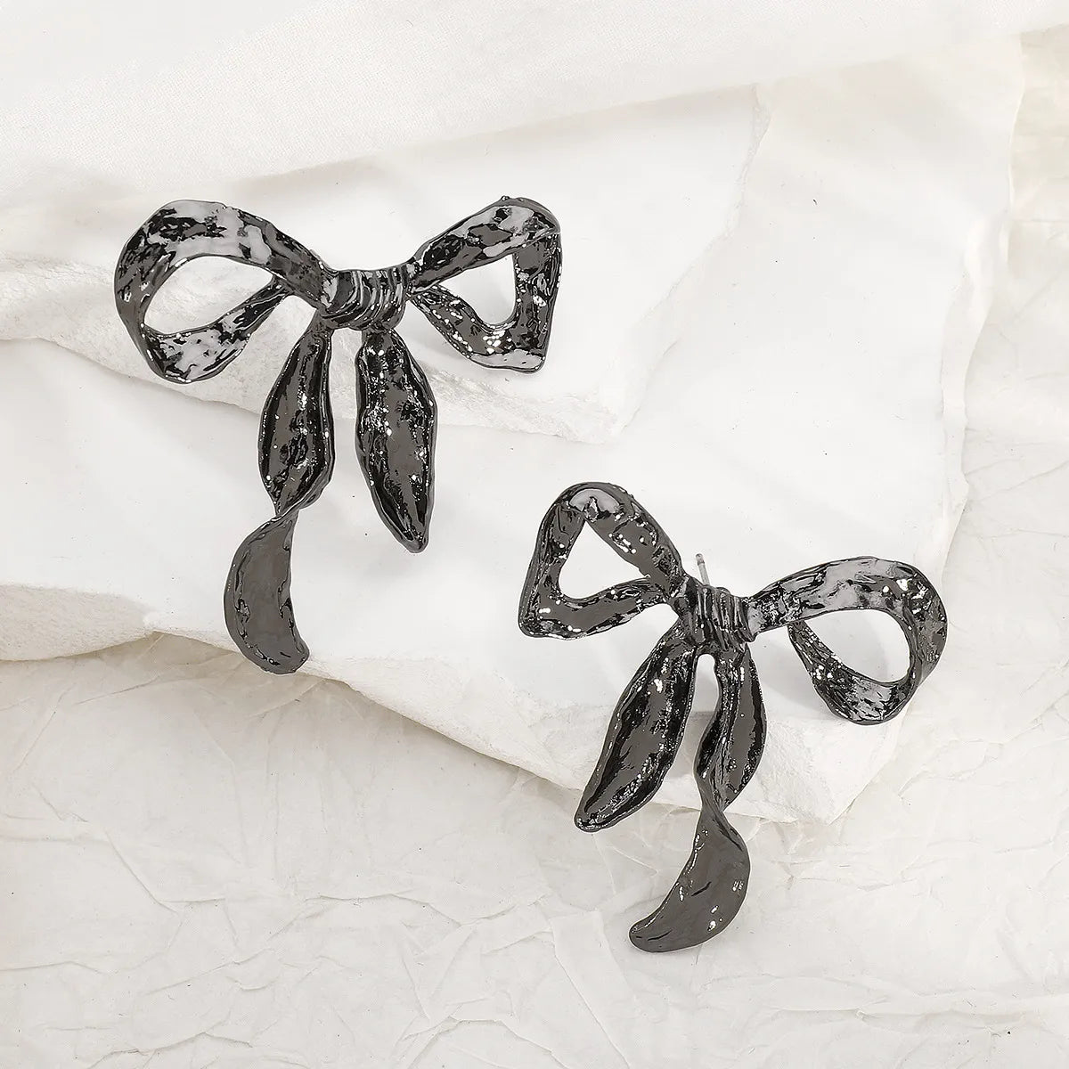 large bow earrings
